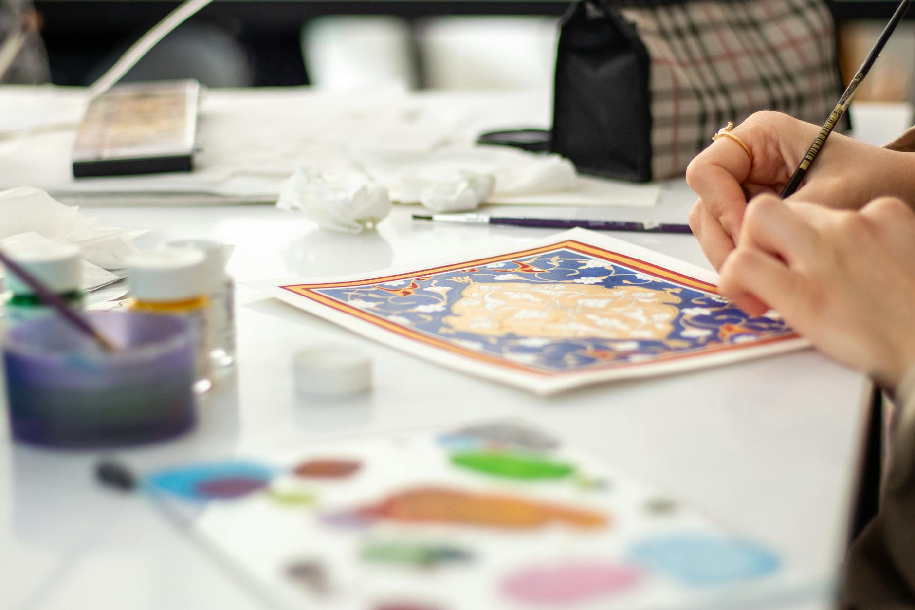 close up of hand painting artistic design
